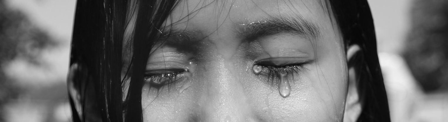 a girl crying tears